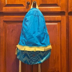 Ivivva backpack/ reversible purse. In great shape.